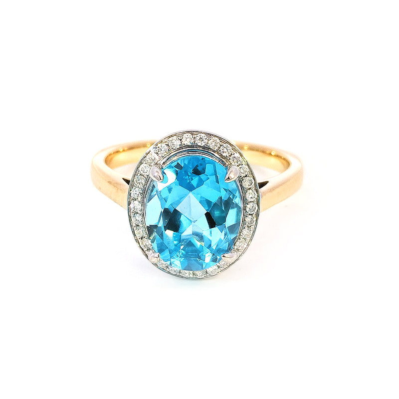 9ct Yellow and White Gold Ring Set with a Topaz and Diamond Topaz = 10 x 8 mm Oval Diamonds 30 Rbcs TDW=0.21cts J/Si