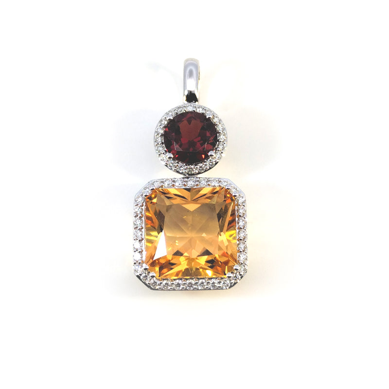 18ct White Gold Garnet & Citrine Pendant set with Diamonds TDW=0.318ct G/Si Chains available separately.