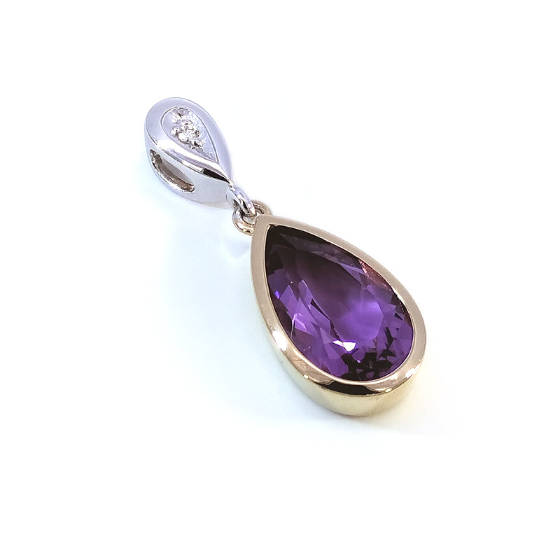18ct Yellow & White Gold Pendant set with a superior quality pear-shaped Amethyst & accent Diamond Chains available separately. TDW=0.02ct G/Si