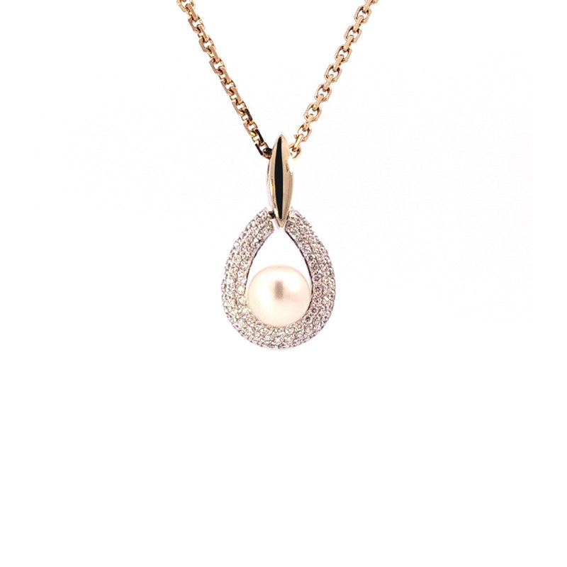 18ct Yellow Gold Diamond and South Sea Pearl Pendant Only TDW= 0.59cts G/Si Chain sold separately. Pendant is a tear drop shaped, pave set shape with the South Sea Pearl set into the bottom of the centre cut out.