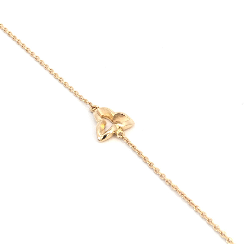 18ct Yellow Gold WILD IRIS Bracelet  Gold Bracelet with a Wild Iris three Leaf motif fixed in the centre